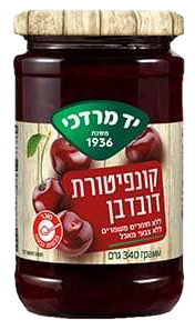 Original Yad Mordechai cherry jar showing photographic fruit imagery and wood texture
