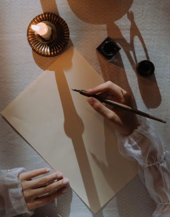 Hand writing with ink and pen