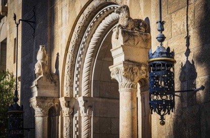 Detail of a carved stone entrance arch on the Jerusalem YMCA building