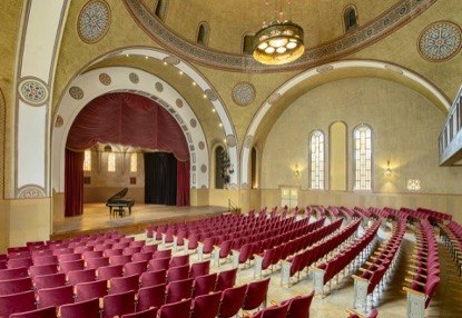 Interior of the YMCA concert hall with arched ceiling