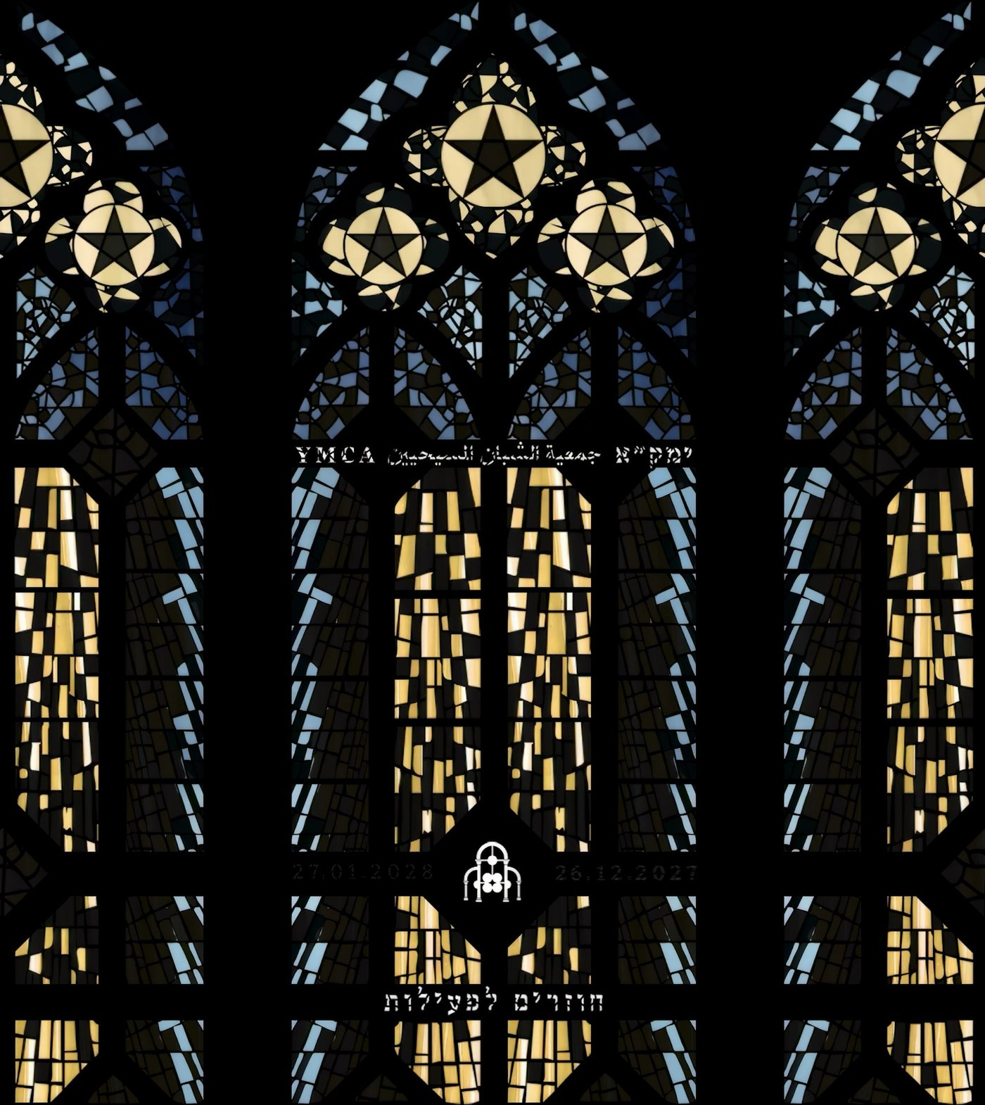 Motion still: stained-glass shapes and trilingual lettering emerging